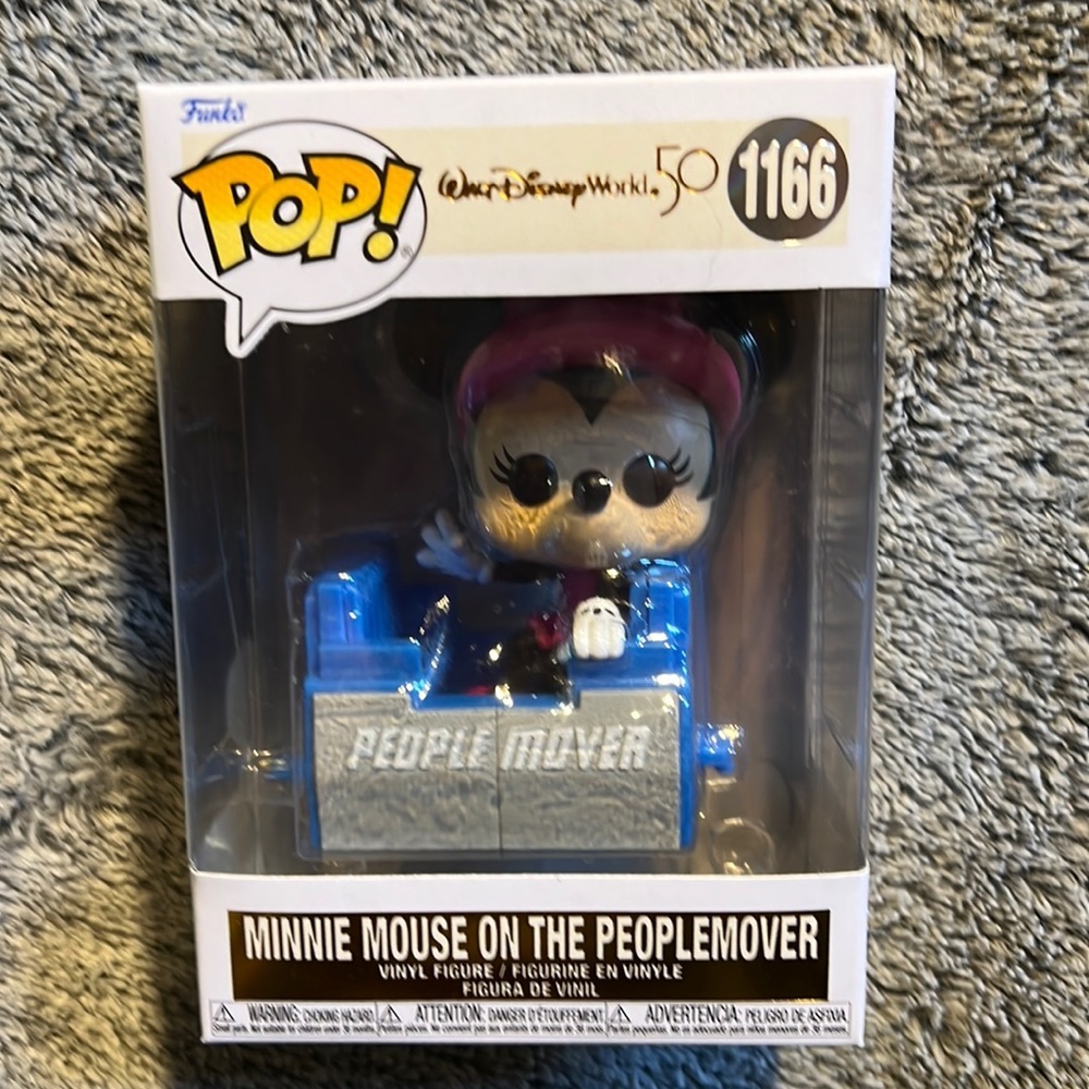 Minnie Mouse on the people mover Funko Pop​
